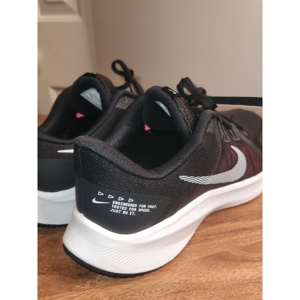 Nike Women's Quest 4 running shoes in black and pink. US Size 8